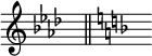 { \omit Score.TimeSignature \key aes \major s8^"" \bar "||" \key f \major s^""}