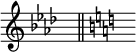 { \omit Score.TimeSignature { \key aes \major s8^"" \bar "||" \key c \major s^""}}