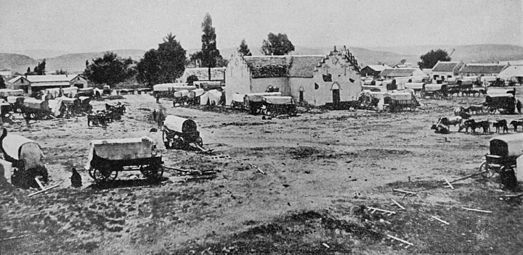 Kerkplein tydens 'n Nagmaalsviering in 1870 nadat die eerste kerk herbou is.