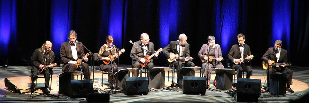 The Ukulele Orchestra of Great Britain performing in 2014, with co-founder Kitty Lux