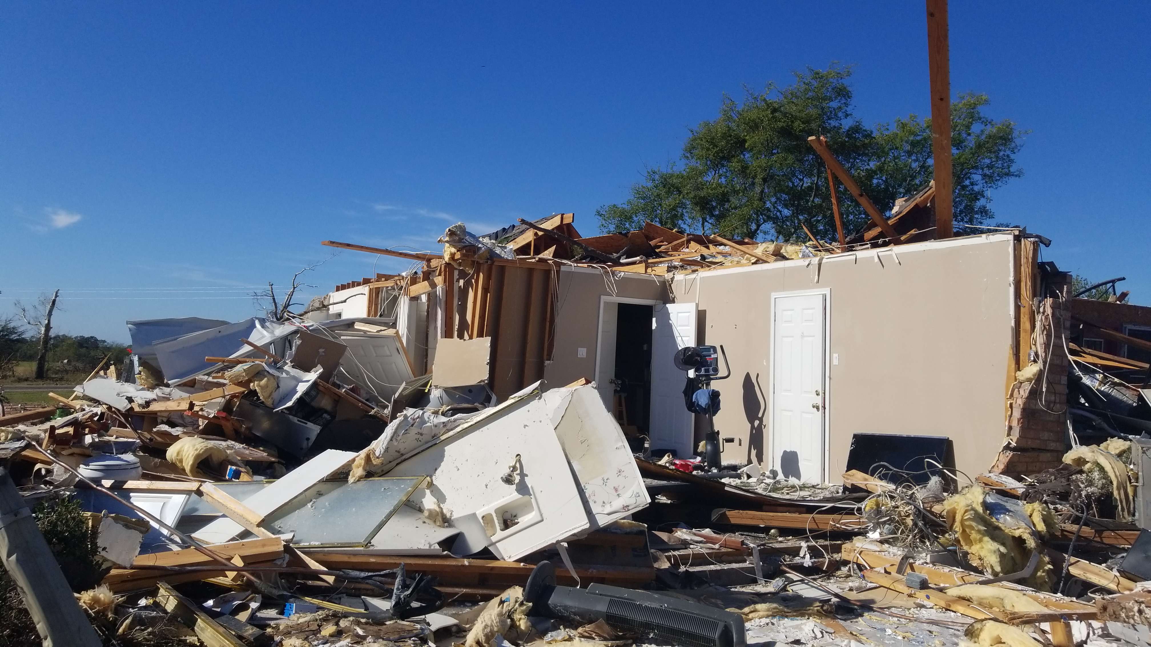 A home that was heavily damaged by an EF2 tornado southwest of Sulphur Springs, Texas.