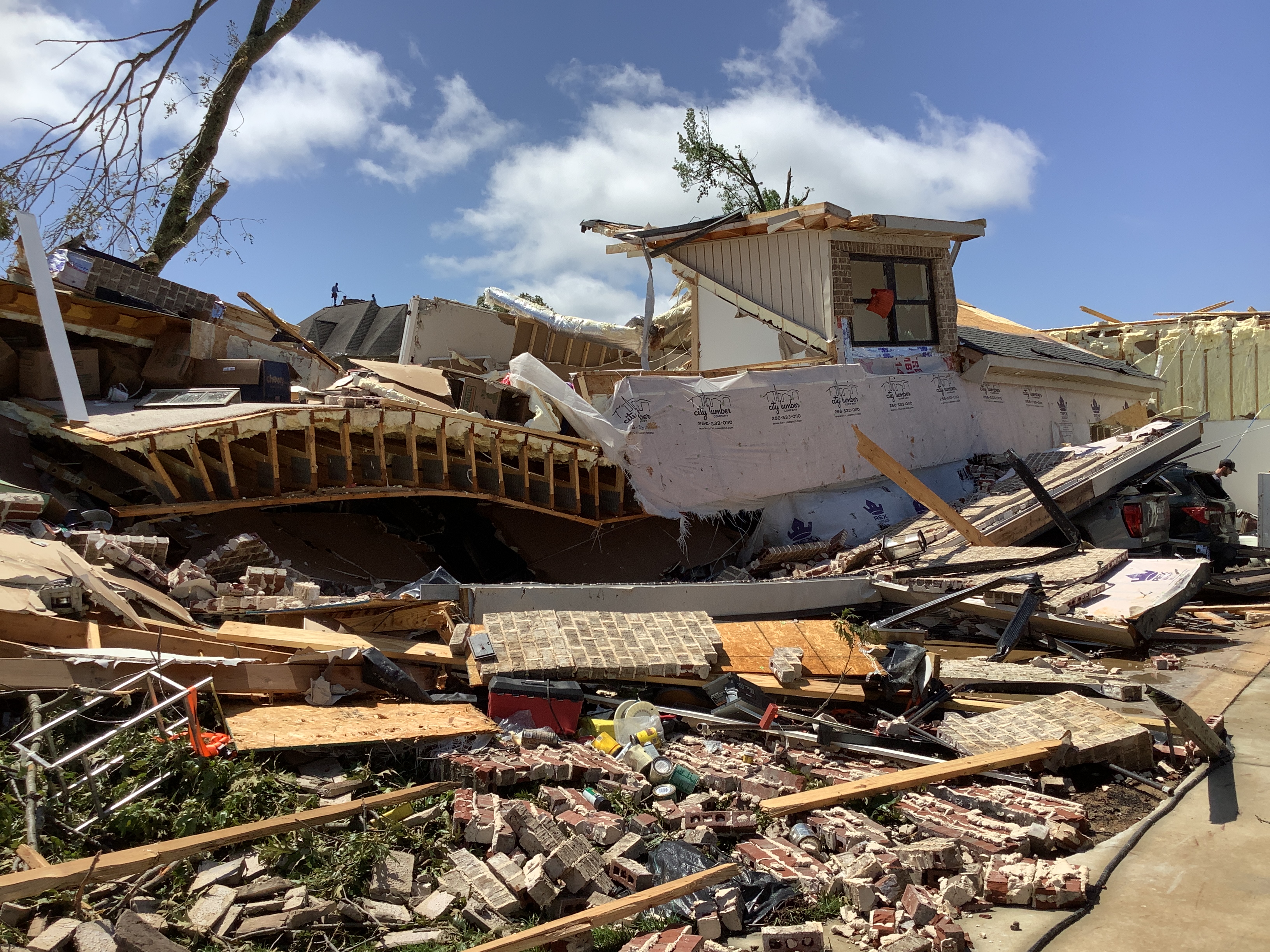 Low-end EF3 damage to a home along Wheeler Lake in the Brigadoon neighborhood in Limestone County, Alabama.