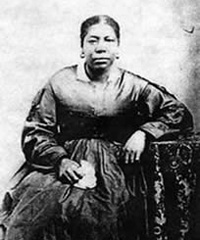 Photo of a seated Jane Manning