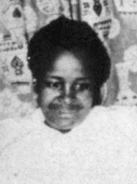 Black and white cropped photograph of an African woman before 1969