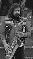 Burney playing saxophone live