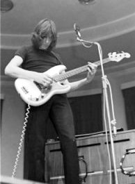English musician Roger Waters with a guitar