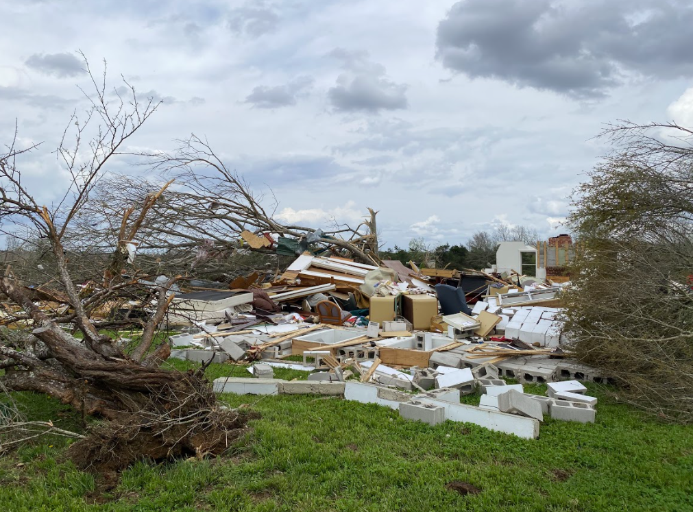 Low-end EF3 damage to a home near Sawyerville, Alabama.