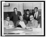 Clarence Mitchell Jr. (seated, bottom left), Borders (seated, bottom center), and A.T. Walden (seated, bottom right), with 3 unknown standing men, 1950.