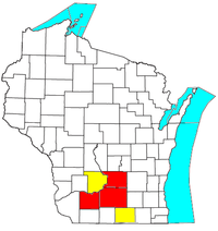 Die Metropolregion Madison (rot) mit Erweiterung zur Madison-Janesville-Beloit Combined Statistical Area (gelb)