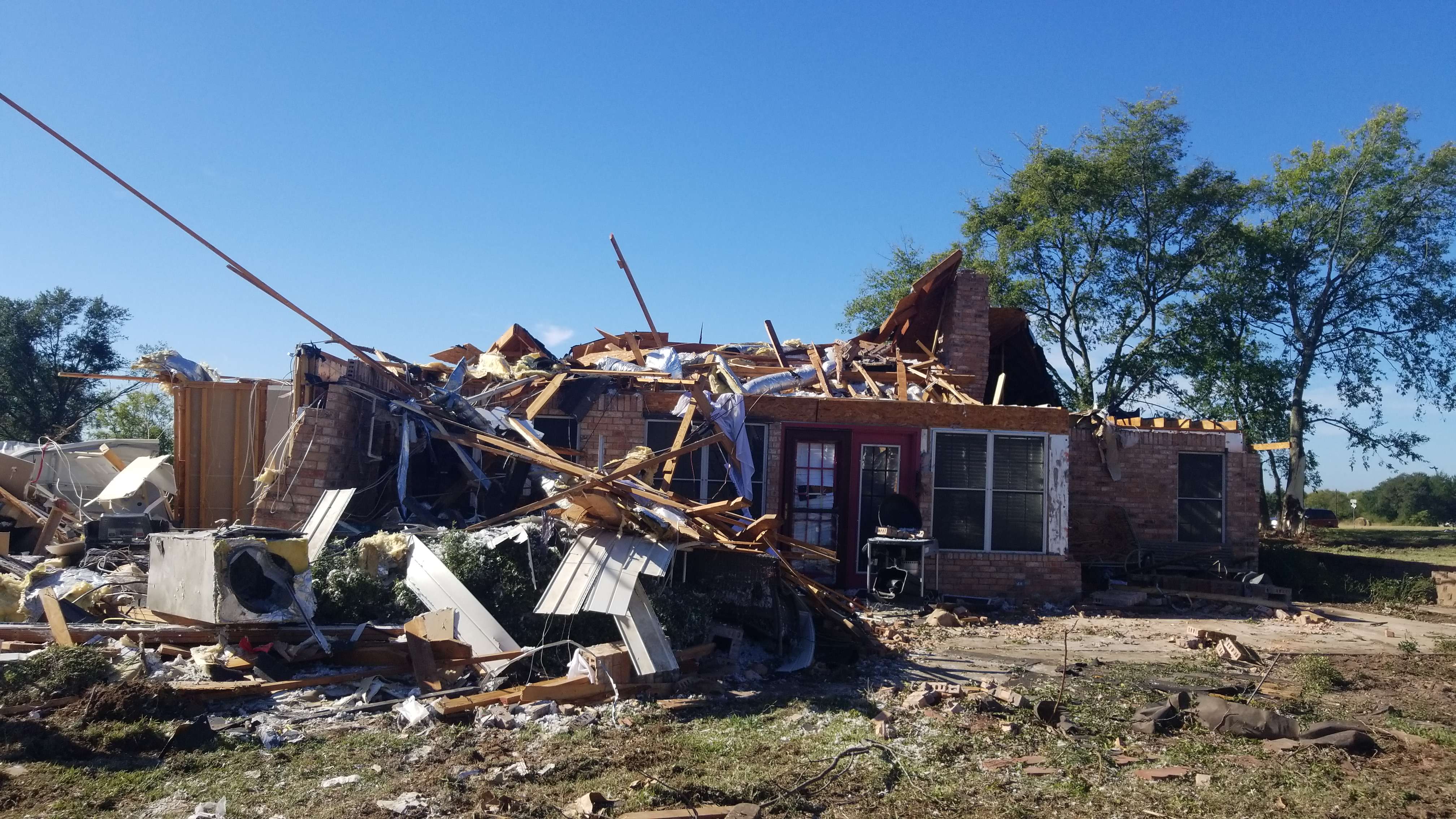 A home that was heavily damaged by an EF2 tornado southwest of Sulphur Springs, Texas.