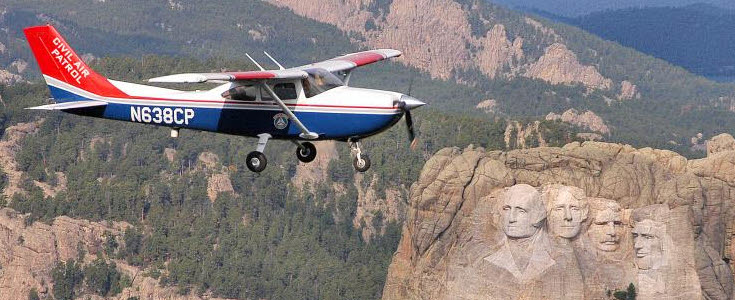 SDWG aircraft flies past Mount Rushmore.jpeg