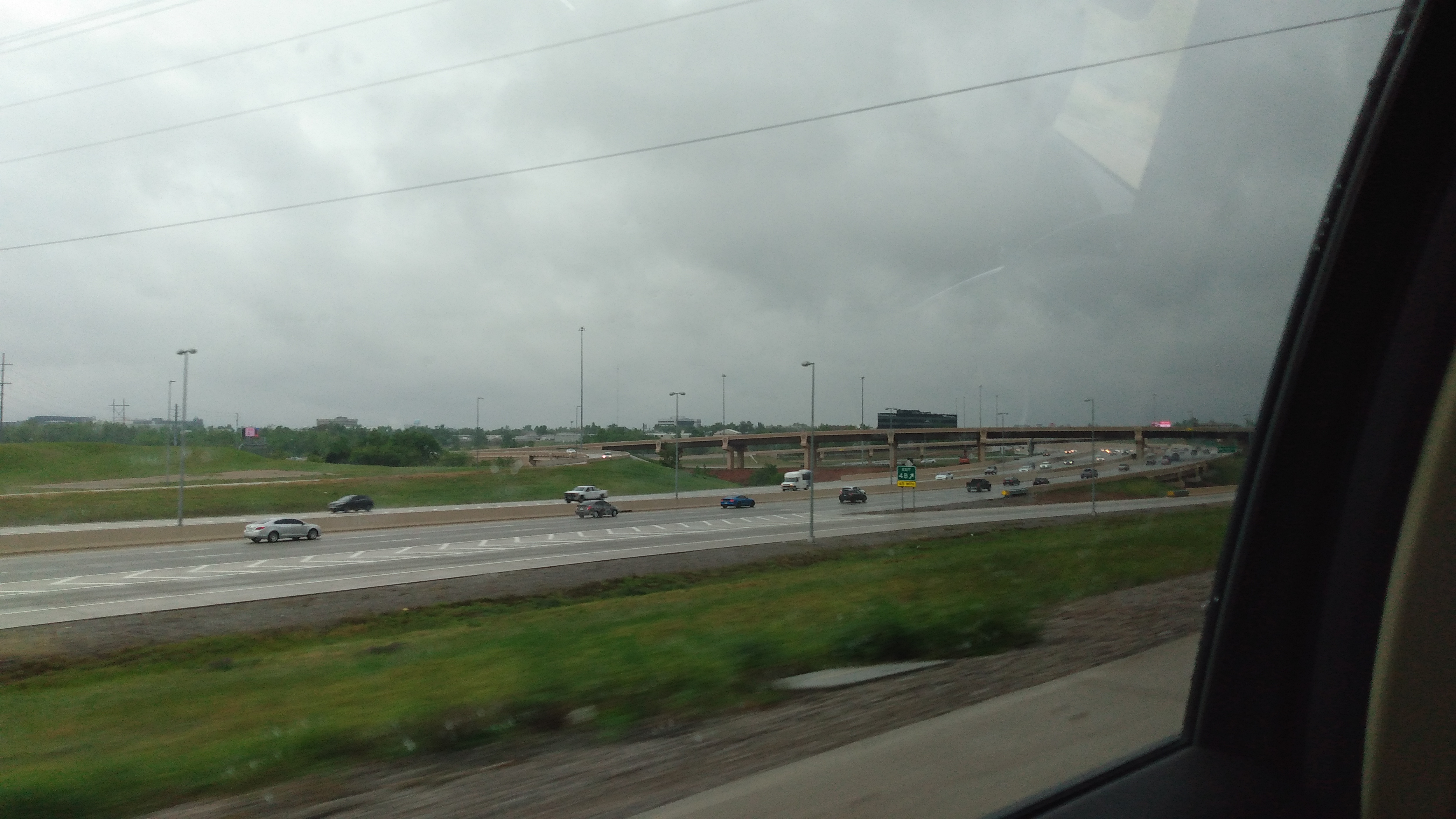 Interstate 235 in Northern Oklahoma City at its northern terminus at the exit 4 interchange with I-44/SH-66 with US 77 (Broadway Extension) continuing northward.