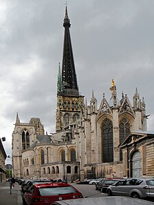 The Chevet, or east end of the cathedral, topped with a gilded statue of the Virgin Mary.