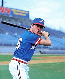 A baseball player in red, white, and blue