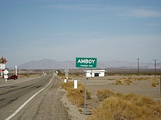 A sign for Amboy on the west side of town