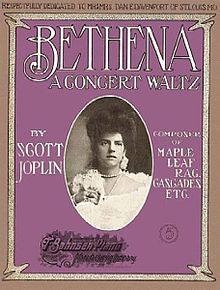 The 1905 front cover of the sheet music shows the title of the work, Bethena, in white lettering on a purple background. In the centre there is a black and white photograph of a young woman wearing white, holding a bunch of flowers.