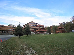 The tallest structure in the Chuang Yen Monastery, the Great Buddha Hall, houses the largest indoor statue of a Buddha in the Western Hemisphere.[1]