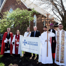 Archbishop of Rwanda Laurent Mbanda (second from right) consecrates the Church of the Redeemer (ACNA) in Highwood, Illinois, in 2019.