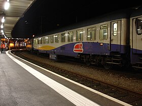 Una Carrozza UIC-X per gli Intercity Notte, in livrea Artesia, revampizzata, ma con le porte a battente.