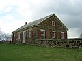 The old Mennonite Meeting House in Harmony, PA, built in 1825.