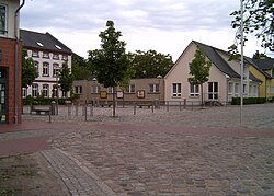 New commune center with the town hall in the background