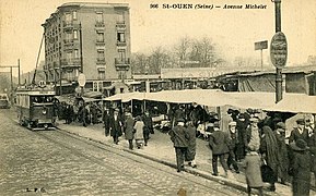 Tramway, avenue Michelet avec les Puces en fond