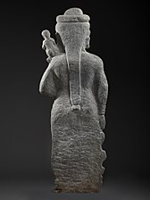 Hariti with children (back). 1st century BCE, Gandhara.