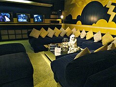 Graceland yellow TV room