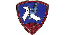 À partir de 1933, insigne de la compagnie de tradition du 110e RIM (110e régiment d'infanterie mécanisée) ayant la garde du drapeau du 73e RI.