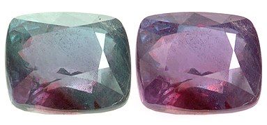 Alexandrite step cut cushion, 26.75 cts. This stone is bluish green in daylight and purple red under incandescent light
