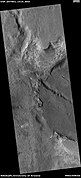 Wide view of layered features, as seen by HiRISE under HiWish program