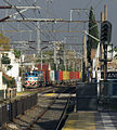 A Ferrosur Roca freight train at Banfield train station.