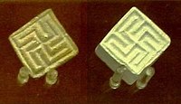 Swastika seals from Mohenjo-daro, Pakistan, of the Indus Valley civilisation, circa 2,100 – 1,750 BCE, preserved at the British Museum[85]