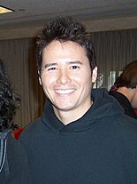 Johnny Yong Bosch, who voices the character in the English dub, has received praise.