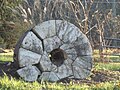 Old millstone at the corner of Green Valley Rd. and Prices Distillery Rd.