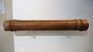 Tagbanwa musical instrument (tube zither) with Tagbanwa calligraphy