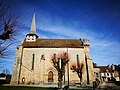 Église Saint-Sylvain avec son clocher en bardeaux de châtaignier.