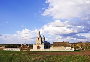 панорама села з новою церквою