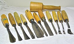Various hand tools for carving wood