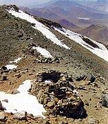 Two small ruined dwellings at about 6700m on Llullaillaco seen from the summit.