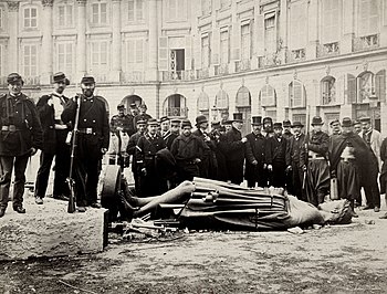 Old photo of historic column being taken apart