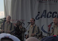 From left to right: singer Jerry Rivas, musical director Rafael Ithier and singers Charlie Aponte and Luis "Papo" Rosario. The first song of El Gran Combo was Tingoli.