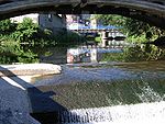 Photo de l'Oise passant sous un pont à Hirson