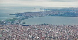 Aerial view above Cumhuriyet neighborhood lying by the shores of & overlooking the Lake of Küçükçekmece