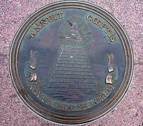 Reverse side of the Great Seal, as depicted by a plaque in Freedom Plaza. (2006)