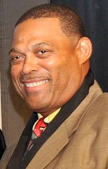 Head shot of Robert Brazile smiling.