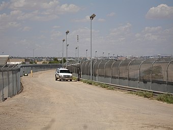 The U.S.–Mexico border fence near El Paso, Texas