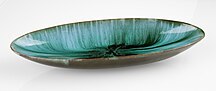 Oval bowl by Blue Mountain Pottery, with the distinctive blue-green glaze