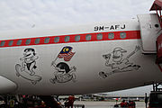 AirAsia airliner adorned with Lat characters (2010).