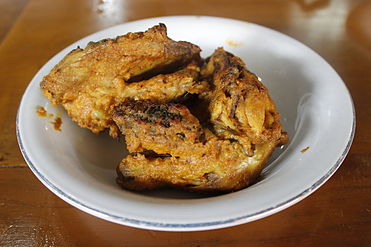 Ayam bakar Padang, Indonesian grilled chicken in rich bumbu (spice mixture); shallot, garlic, chili pepper, candlenut, galangal and turmeric
